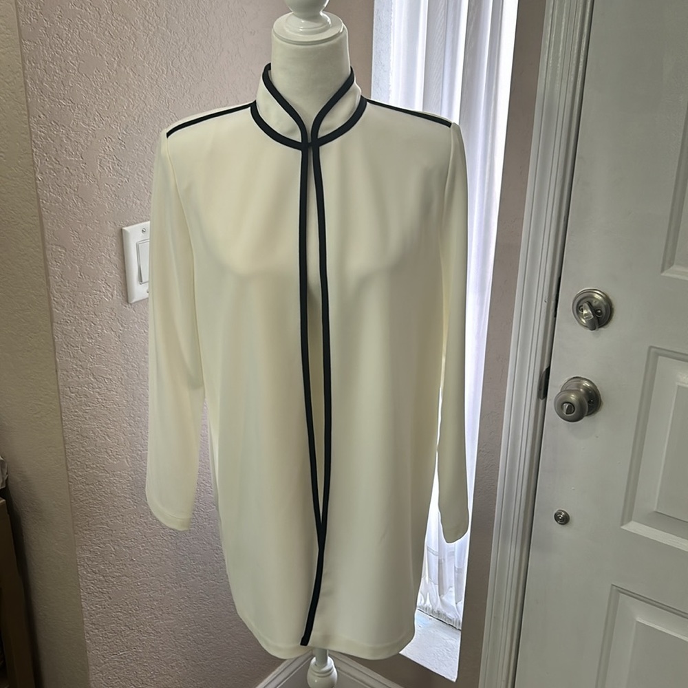 Chico’s White jacket or topper with black trim